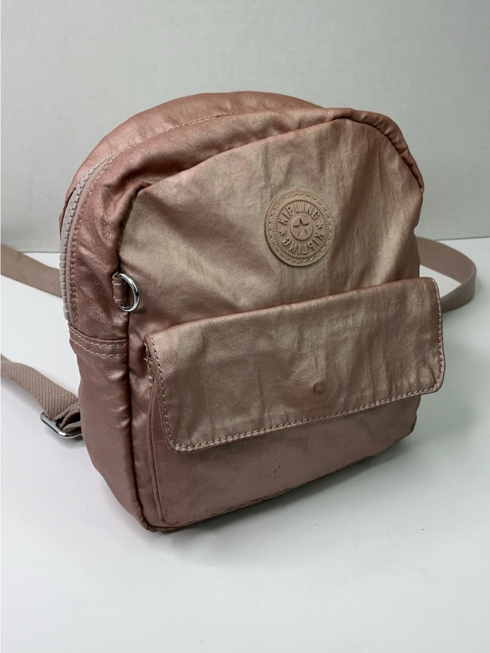 Kipling Rose Gold Compact Crossbody Backpack